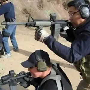 A group of people with guns and helmets.