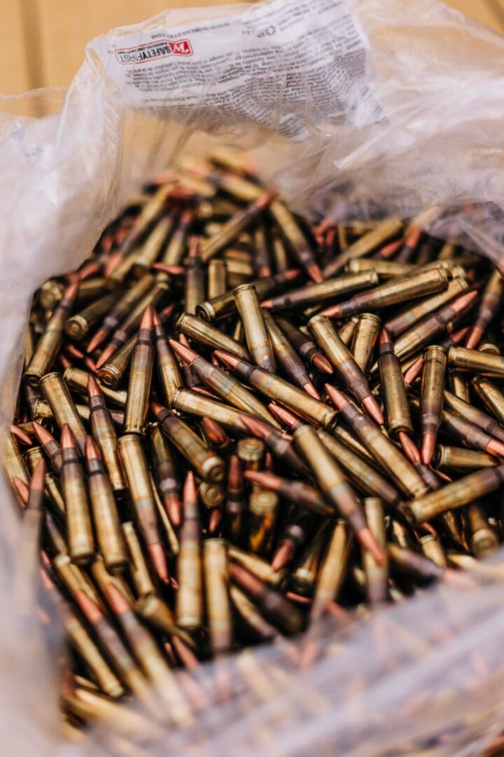 A large amount of bullets are in the bin.